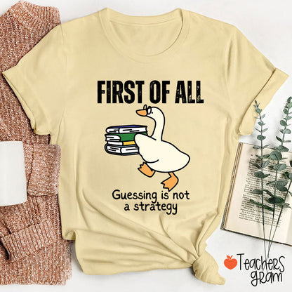 First Of All Guessing Is Not A Strategy Teacher T-Shirt